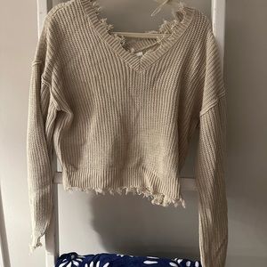 Cream sweater